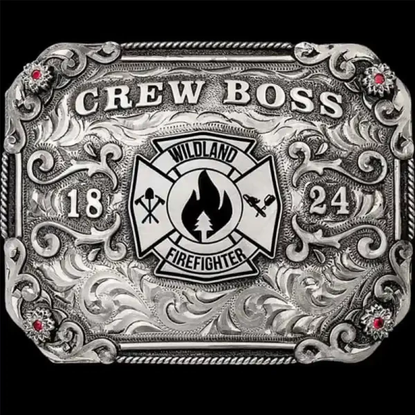 "Our Boise Belt Buckle is the perfect addition to represent your department. Crafted on a German Silver base, it features expertly hand-engraved western scrollwork, flowers in each corner with cubic zirconia stones, and is tied together with a tradit